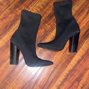 Steve Madden Black Heeled Boots with Sleek Knit Design